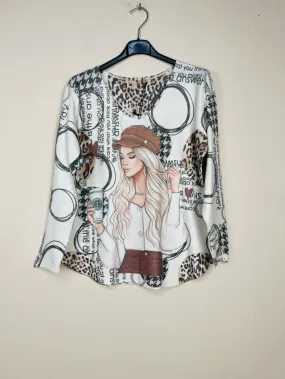 Pullover mit V-Ausschnitt und Muster, lange Ärmel.